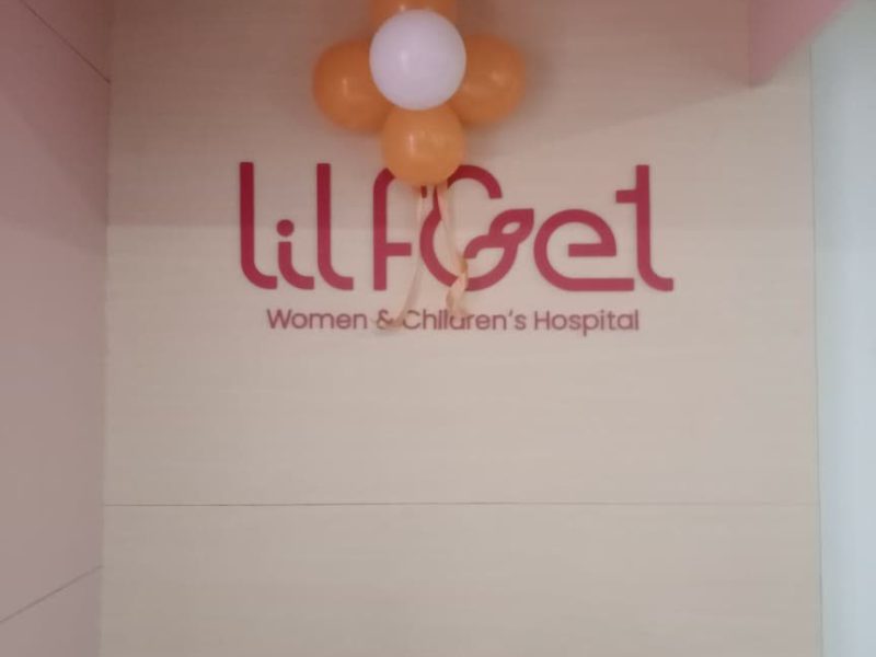 LilFeet Women and Children's Hospital in cut acrylic letters on a reception wall