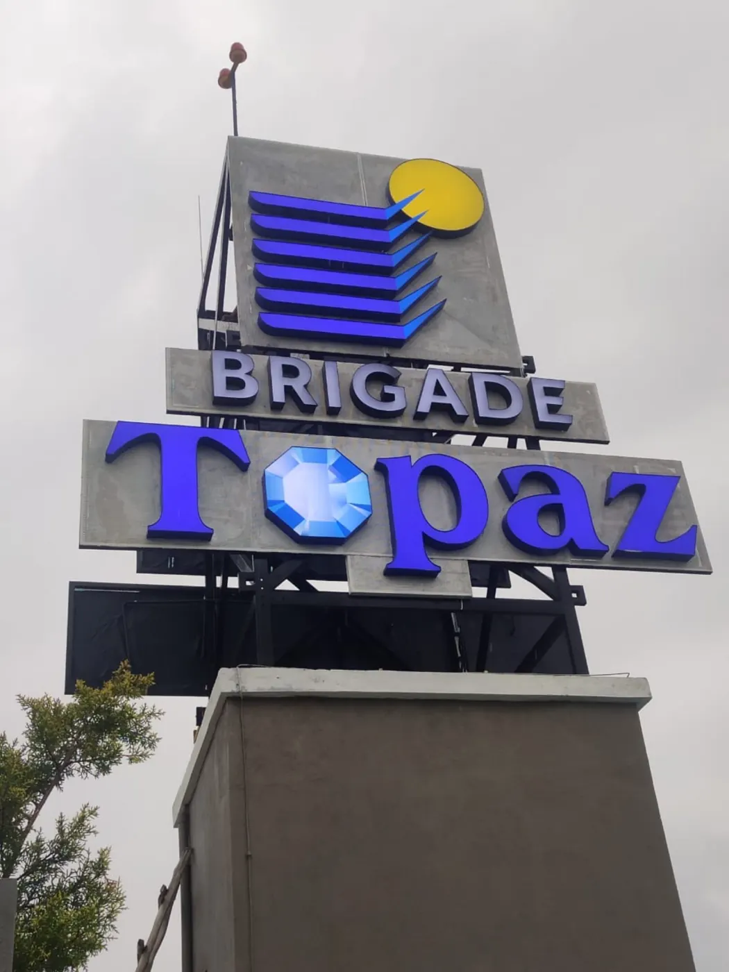 Brigade Topaz project pylon with blue letters and the Brigade mark