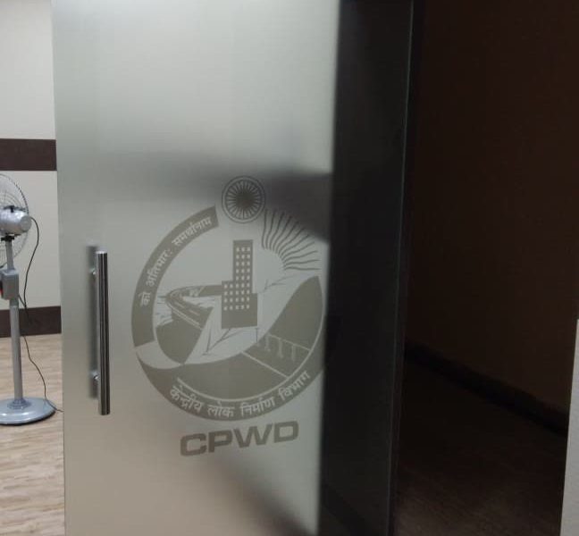 Frosted film with a CPWD logo on a glass door