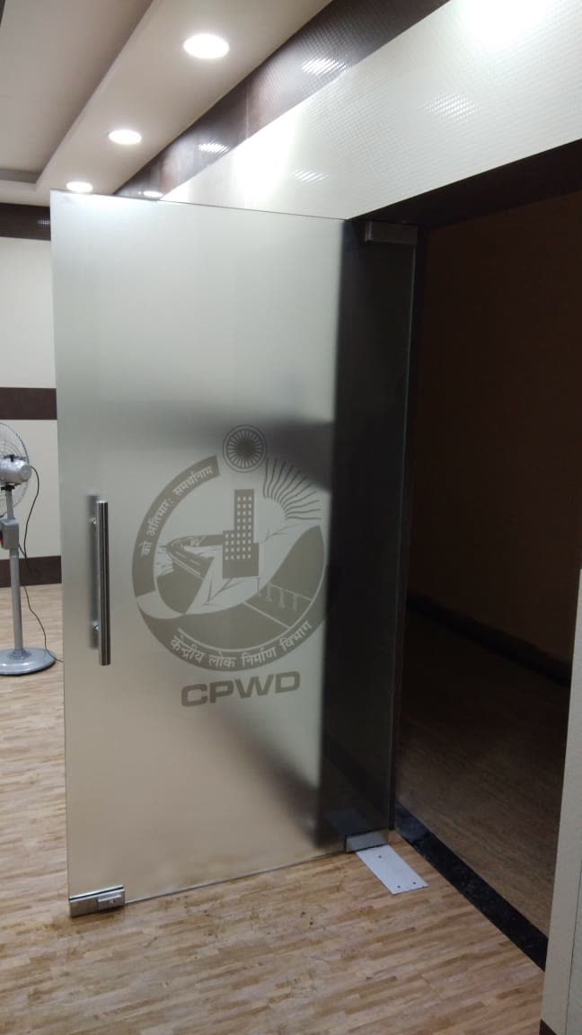 Frosted film with a CPWD logo on a glass door