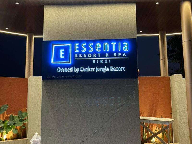 Essentia Resort and Spa, Sirsi, sign in English lit blue at night