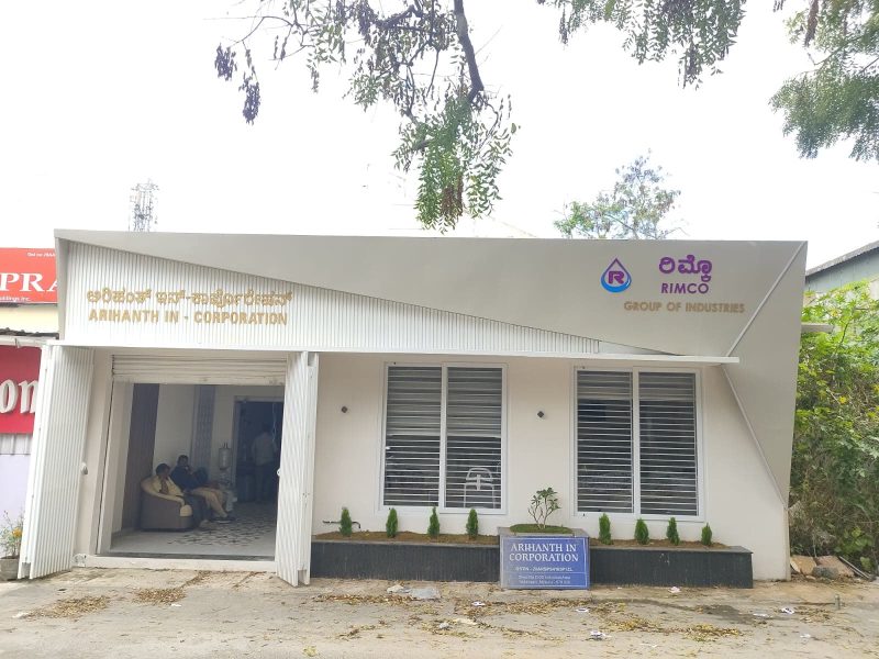 Office facade with cut letters reading RIMCO Group of Industries and Arihanth In-Corporation