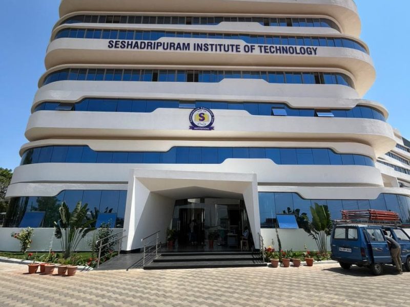 Seshadripuram Institute of Technology: letters along the curved bands of the building facade